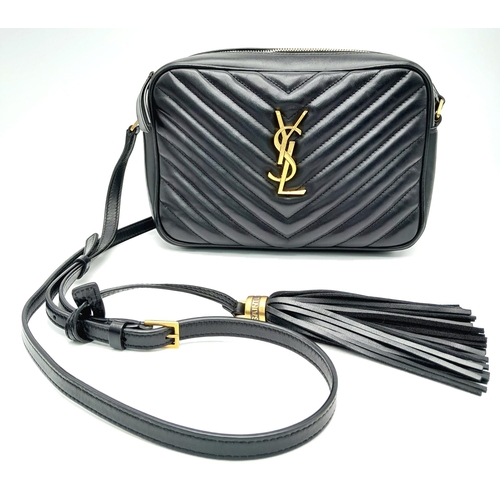 41 - A YSL Saint Laurent Black Lou Matelasse Camera Bag. Leather exterior, gold-tone hardware, adjustable... 