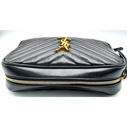 41 - A YSL Saint Laurent Black Lou Matelasse Camera Bag. Leather exterior, gold-tone hardware, adjustable... 