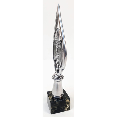 503 - A Chromed Aluminium Top ornament on a polished marble plinth