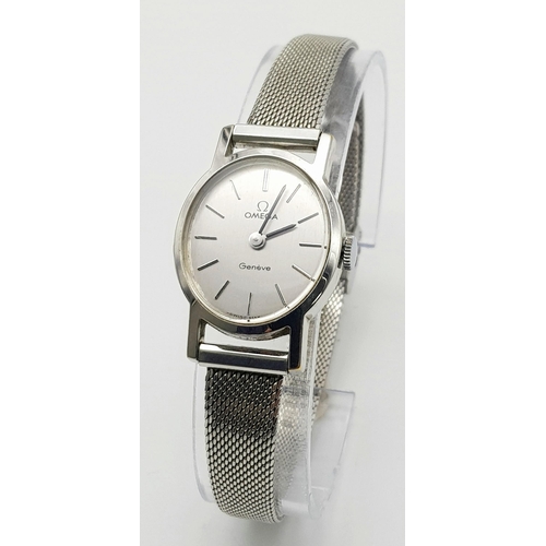 183 - A Classic Omega Geneve Quartz Ladies Watch. Stainless steel bracelet and case - 21mm. Silver tone di... 