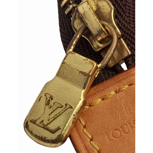 136 - A Louis Vuitton Monogram Poche Toilette Pouch. Leather exterior with gold-tone hardware, zipped top ... 