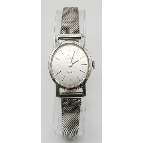 183 - A Classic Omega Geneve Quartz Ladies Watch. Stainless steel bracelet and case - 21mm. Silver tone di... 