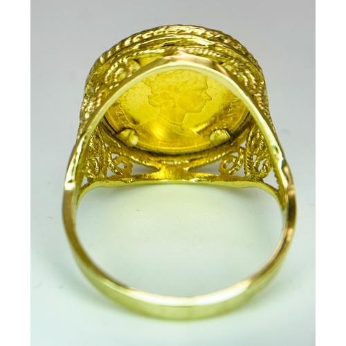 410 - A Fine Gold (.999) Isle of Man 1/25th oz Coin. In a 14K gold ring setting. Size N. 4.8g total weight... 