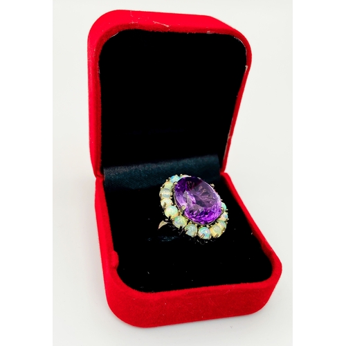 507 - A Brazilian Amethyst & Ethiopian Fire Opal Ring! Set in 925 silver. A 21ct amethyst with an opal sur... 