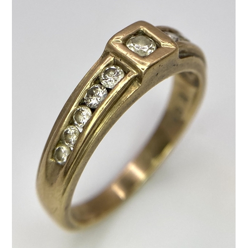 64 - A Vintage 9K Yellow Gold Diamond Half-Eternity Ring. Belt buckle design. Size R. 3.7g total weight.