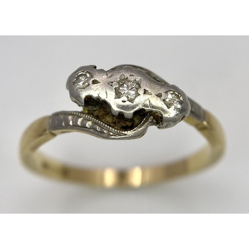 65 - A Vintage 18K Yellow Gold, Platinum and Old Cut Diamond Crossover Ring. Three old cut gypsy-set diam... 