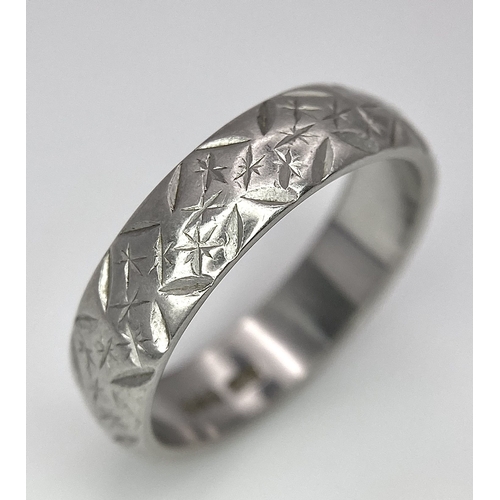 80 - A Vintage Platinum Band Ring with Geometric Decorative Pattern. 5mm width. Size P. 7.5g