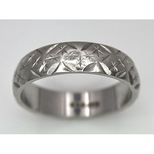 80 - A Vintage Platinum Band Ring with Geometric Decorative Pattern. 5mm width. Size P. 7.5g