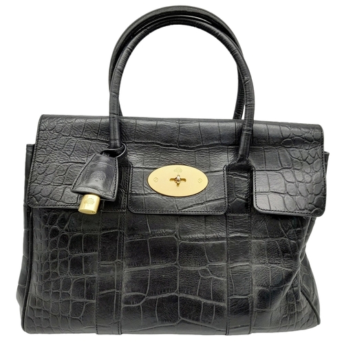 101 - A Mulberry Bayswater Handbag. Black Croc Embossed Leather exterior, gold-tone hardware, a clochette,... 