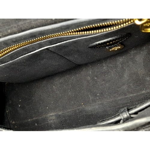 101 - A Mulberry Bayswater Handbag. Black Croc Embossed Leather exterior, gold-tone hardware, a clochette,... 