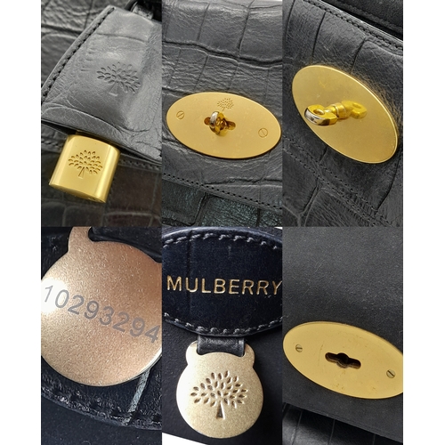 101 - A Mulberry Bayswater Handbag. Black Croc Embossed Leather exterior, gold-tone hardware, a clochette,... 