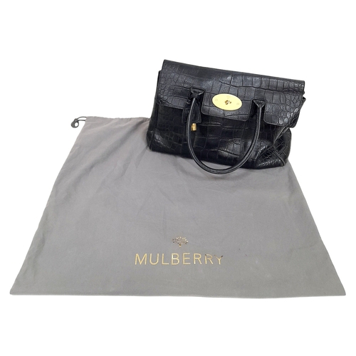 101 - A Mulberry Bayswater Handbag. Black Croc Embossed Leather exterior, gold-tone hardware, a clochette,... 