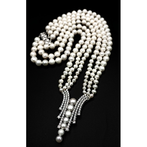 104 - A magnificent necklace with three graduating rows of natural white mature pearls for the South Seas,... 