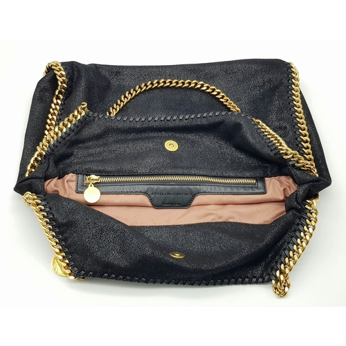 122 - A Stella McCartney Black Falabella Shoulder/Tote Bag. Faux suede exterior with gold-toned heavy hard... 