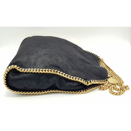 122 - A Stella McCartney Black Falabella Shoulder/Tote Bag. Faux suede exterior with gold-toned heavy hard... 