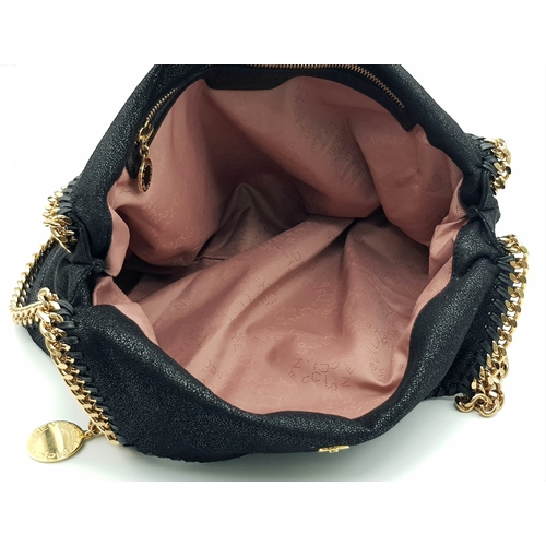 122 - A Stella McCartney Black Falabella Shoulder/Tote Bag. Faux suede exterior with gold-toned heavy hard... 