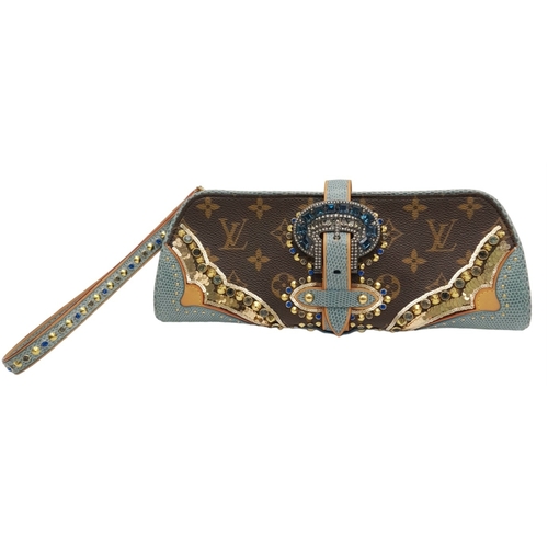 13 - A Louis Vuitton Monogram Les Extraordinaires Clutch Bag. Leather exterior with stone and stud embell... 