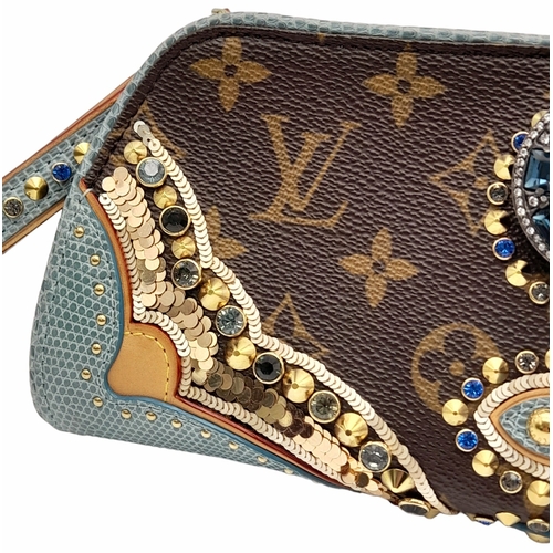 13 - A Louis Vuitton Monogram Les Extraordinaires Clutch Bag. Leather exterior with stone and stud embell... 