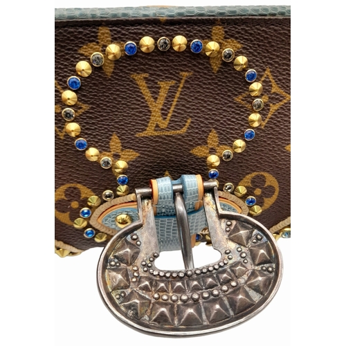 13 - A Louis Vuitton Monogram Les Extraordinaires Clutch Bag. Leather exterior with stone and stud embell... 