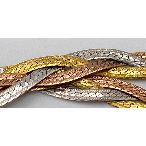 16 - A 9K Tri-Colour Gold Entwined Flat Necklace. 44cm. 7.6g weight