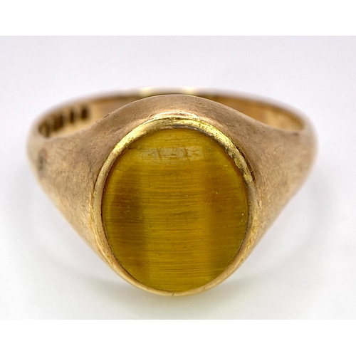 169 - A Vintage 9K Yellow Gold Tigers Eye Ring. Size U. 3.95g total weight.