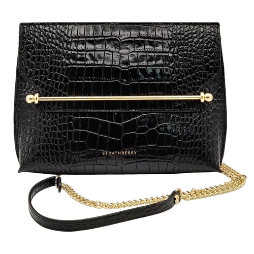 185 - A Strathberry Black THE STYLIST Crossbody Bag. Crocodile embossed leather exterior with gold-toned h... 