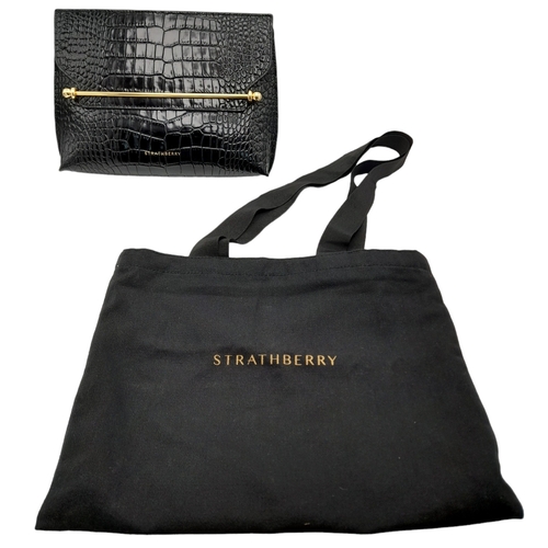 185 - A Strathberry Black THE STYLIST Crossbody Bag. Crocodile embossed leather exterior with gold-toned h... 