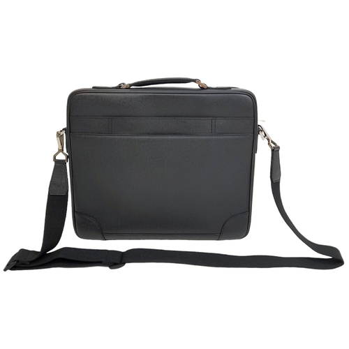 48 - A Louis Vuitton Black Business Bag. Leather exterior with silver-toned hardware, zipped compartment ... 