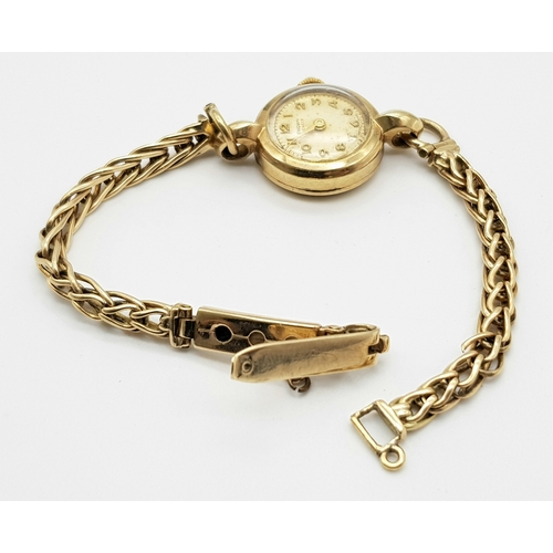 51 - A Vintage 9K Yellow Gold Renown Ladies Watch. 9K gold bracelet and case - 18mm. Patinaed dial. Mecha... 