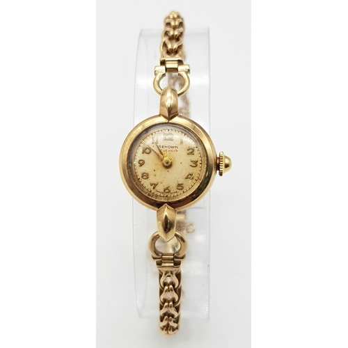 51 - A Vintage 9K Yellow Gold Renown Ladies Watch. 9K gold bracelet and case - 18mm. Patinaed dial. Mecha... 