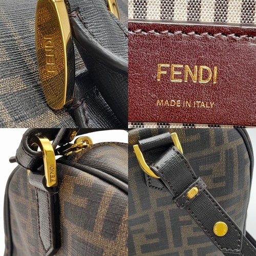 53 - A Fendi Zucca Canvas Boston Bag. Canvas exterior, gold-tone hardware, adjustable strap, zipped top c... 