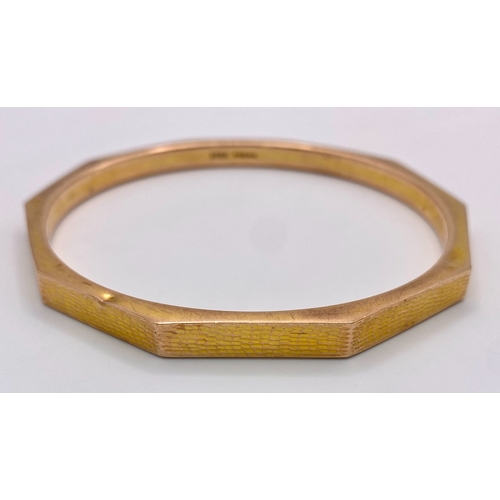 659 - A Vintage 9K Rose Gold Decagon Bangle. 7.5cm inner diameter. 14g weight.