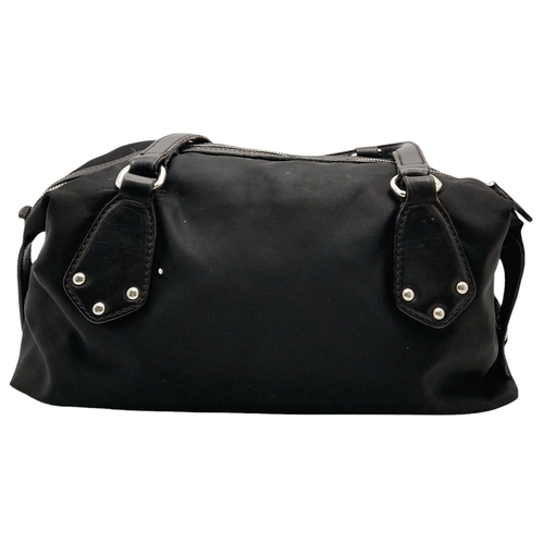 74 - A Prada Black Tessuto Satchel. Textile exterior with leather trim, silver-tone hardware, a top zip c... 