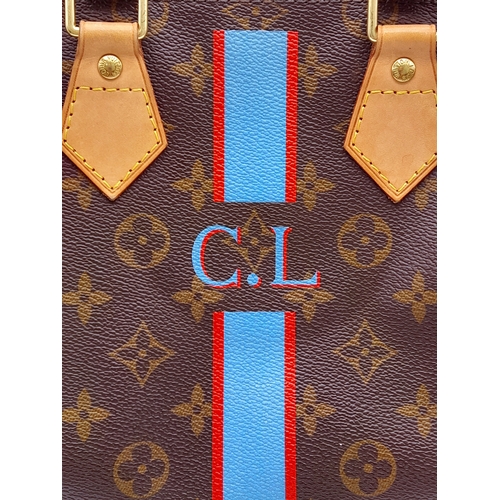 81 - A Louis Vuitton Monogram Stripe Canvas Speedy Perso Bag. LV monogram canvas exterior with C.L. initi... 