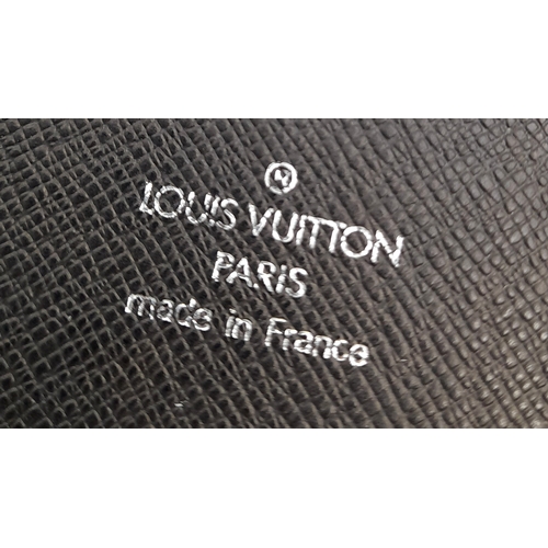 88 - A Louis Vuitton Business Planner Case. Leather exterior with LV logo in the corner. Press stud closu... 