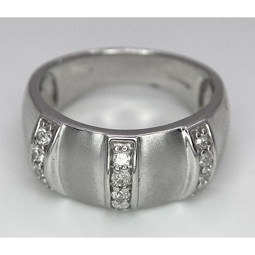 106 - A 9K WHITE GOLD MATTE/POLISHED DIAMOND SET RING. 0.15ctw Size N, 6.2g total weight. Ref: SC 8001