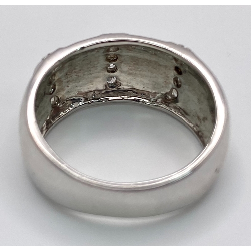 106 - A 9K WHITE GOLD MATTE/POLISHED DIAMOND SET RING. 0.15ctw Size N, 6.2g total weight. Ref: SC 8001