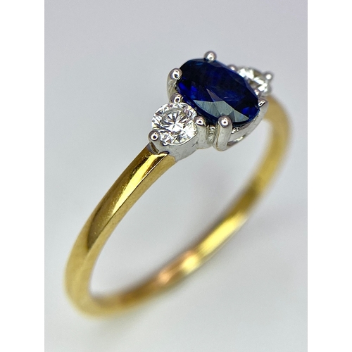 130 - AN 18K YELLOW GOLD DIAMOND AND SAPPHIRE 3 STONE RING. 0.50CT. OVAL BLUE SAPPHIRE. 2.5G. SIZE N