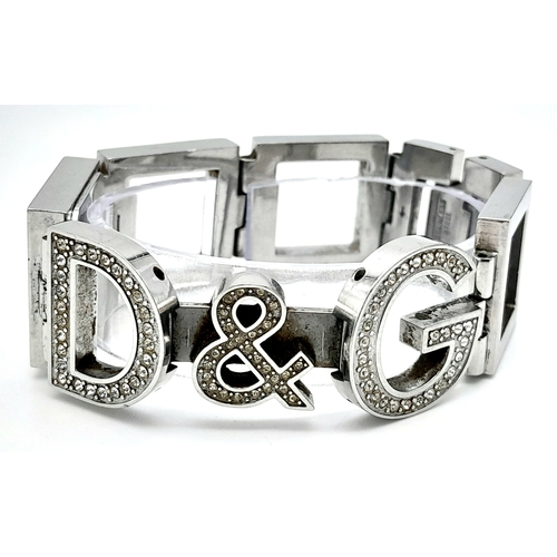 174 - The very iconic ladies DOLCE & GABBANA watch with the D & G logo studded in Swarovski crystals. Rect... 