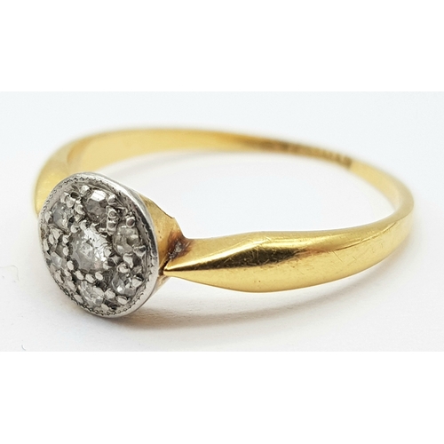 246 - A Delicate Vintage 18K Gold Diamond Cluster Ring. Size L. 1.8g total weight.