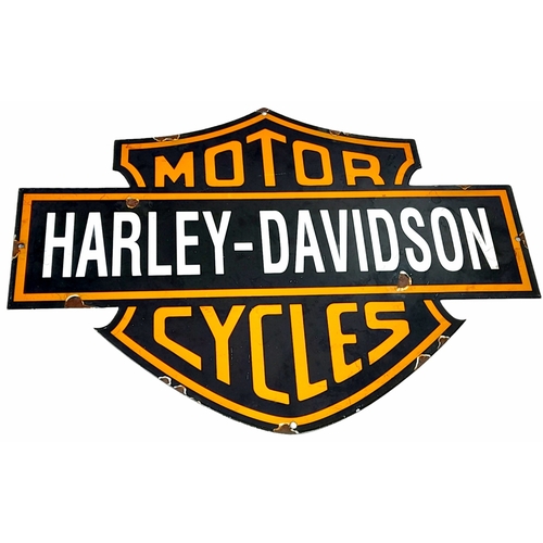 345 - A Vintage Repro Harley Davidson Die-Cut Enamel sign. In good condition - a few small rust marks but ... 