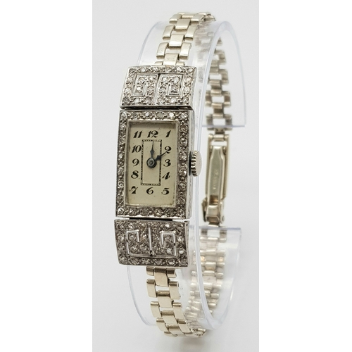 352 - An Antique Art Deco Platinum and Diamond Ladies Watch. Note: Original bracelet has been replace with... 