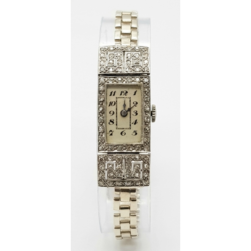 352 - An Antique Art Deco Platinum and Diamond Ladies Watch. Note: Original bracelet has been replace with... 