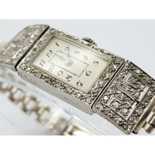 352 - An Antique Art Deco Platinum and Diamond Ladies Watch. Note: Original bracelet has been replace with... 