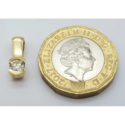 373 - A 9K Yellow Gold (tested) Brilliant Round Cut Diamond Pendant. 0.30ct diamond. 14m. 1.3g total weigh... 