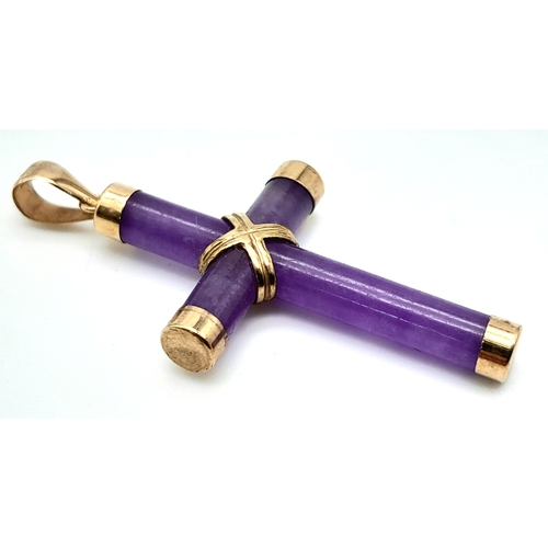 381 - A 9K Yellow Gold Amethyst Cross Pendant. 4.9cm length, 2.3g total weight.