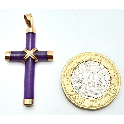 381 - A 9K Yellow Gold Amethyst Cross Pendant. 4.9cm length, 2.3g total weight.