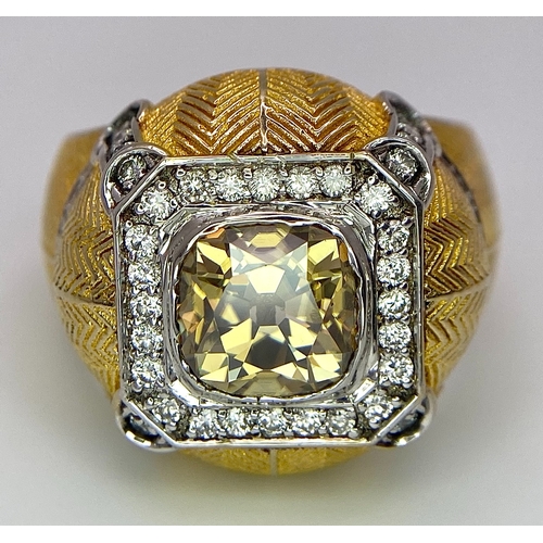 393 - An 18K Yellow Gold Diamond Dress Ring. A 2.5ct central globular cut yellow diamond, with a round cut... 