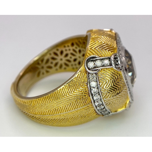 393 - An 18K Yellow Gold Diamond Dress Ring. A 2.5ct central globular cut yellow diamond, with a round cut... 