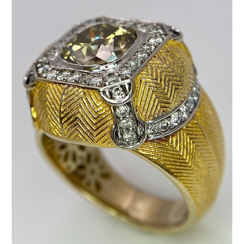 393 - An 18K Yellow Gold Diamond Dress Ring. A 2.5ct central globular cut yellow diamond, with a round cut... 